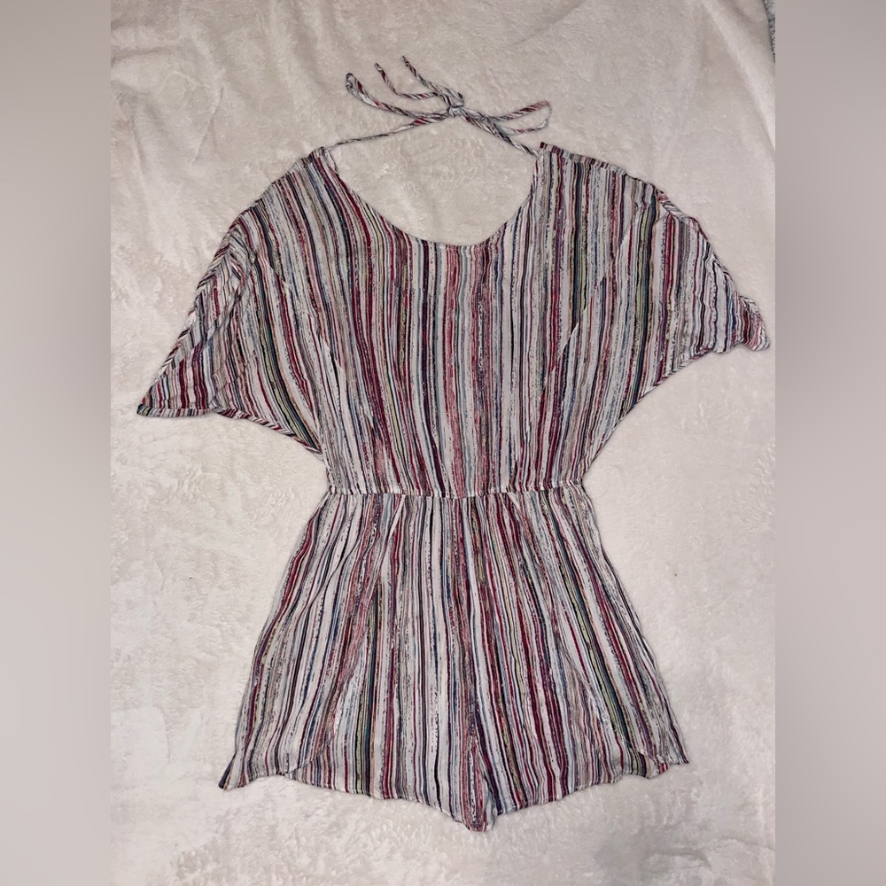 BCBG romper, size medium. Wore only a few times. Great condition.